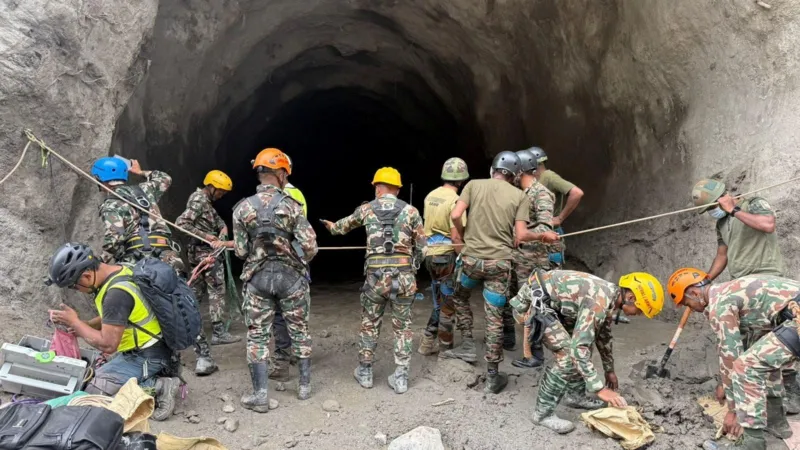 Nepal rescuers blast hillside in search of hydropower workers as families wait anxiously
